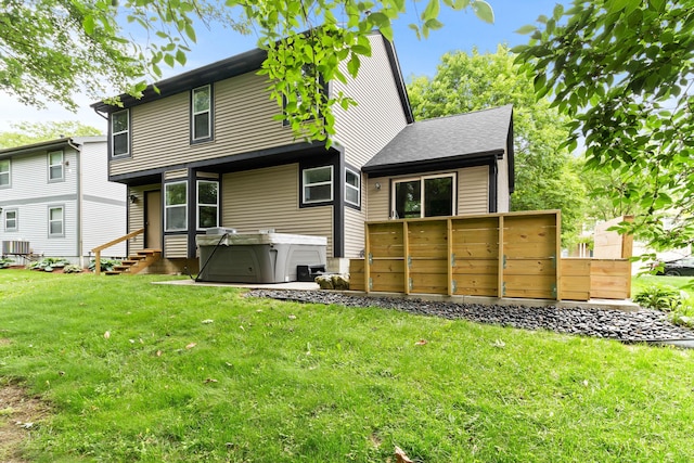 4465 Big Walnutview Dr, Columbus, OH 43230 - back of house with entry steps, a yard, and central AC