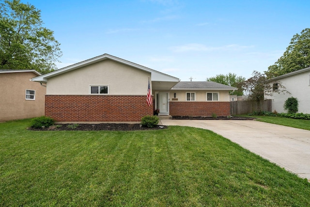 3544 Devin Rd, Grove City, OH 43123 - view of front of property with stucco siding, brick siding, and driveway