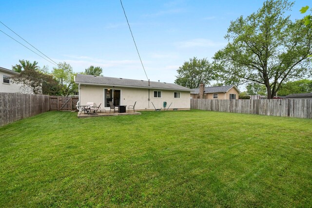 3544 Devin Rd, Grove City, OH 43123 - back of house featuring a patio area and stucco siding