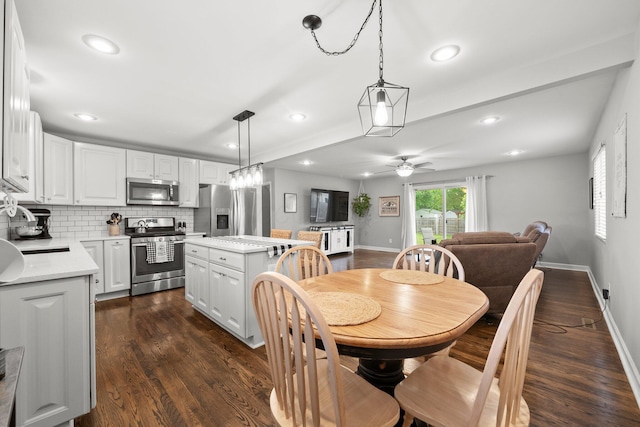 3544 Devin Rd, Grove City, OH 43123 - dining space featuring dark wood-style flooring, ceiling fan, recessed lighting, and baseboards