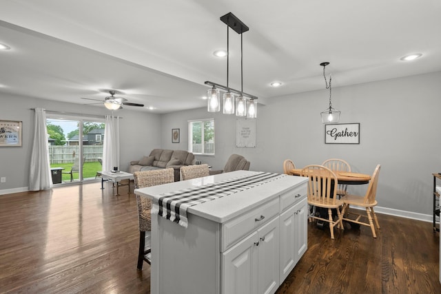3544 Devin Rd, Grove City, OH 43123 - kitchen featuring healthy amount of natural light, recessed lighting, a center island, a ceiling fan, and dark wood-type flooring