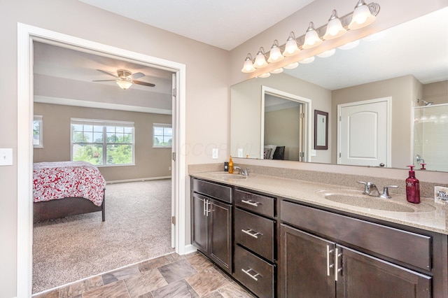 1705 Bent Creek Dr, Lancaster, OH 43130 - bathroom featuring double vanity, ensuite bathroom, a ceiling fan, and baseboards