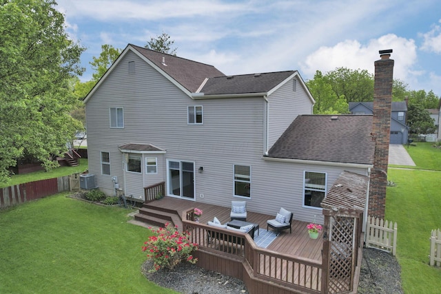 5706 Turner Ln, Hilliard, OH 43026 - back of house with central AC unit, a chimney, a shingled roof, and a deck