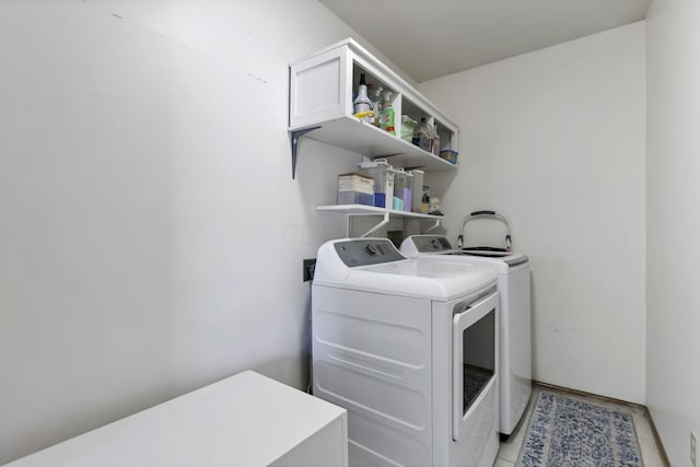 5706 Turner Ln, Hilliard, OH 43026 - washroom featuring washing machine and clothes dryer and cabinet space