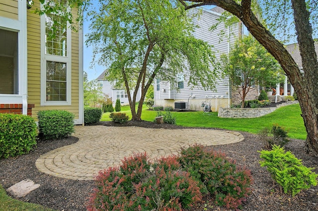 273 Blue Jacket Cir, Pickerington, OH 43147 - view of grassy yard with a patio and central air condition unit