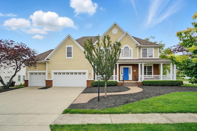 273 Blue Jacket Cir, Pickerington, OH 43147 - traditional home with a porch, brick siding, an attached garage, driveway, and a shingled roof