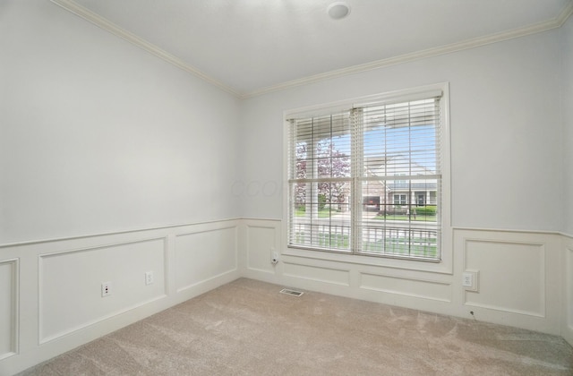 273 Blue Jacket Cir, Pickerington, OH 43147 - carpeted empty room featuring ornamental molding, a wainscoted wall, and a decorative wall