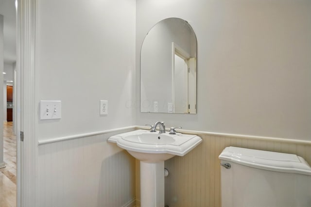 273 Blue Jacket Cir, Pickerington, OH 43147 - bathroom featuring toilet and wainscoting