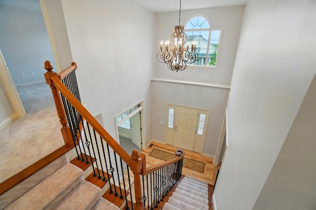 273 Blue Jacket Cir, Pickerington, OH 43147 - entryway featuring a chandelier, baseboards, and a high ceiling