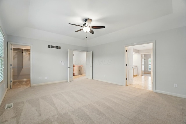 273 Blue Jacket Cir, Pickerington, OH 43147 - unfurnished bedroom featuring light colored carpet, baseboards, and a spacious closet