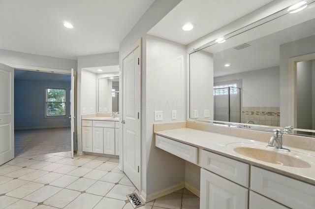 273 Blue Jacket Cir, Pickerington, OH 43147 - bathroom featuring healthy amount of natural light, vanity, baseboards, and recessed lighting