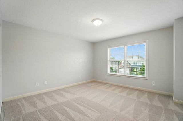 273 Blue Jacket Cir, Pickerington, OH 43147 - unfurnished room with baseboards and light colored carpet