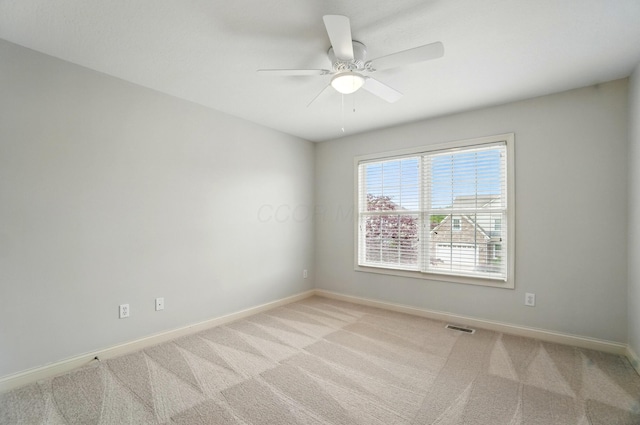 273 Blue Jacket Cir, Pickerington, OH 43147 - unfurnished room with baseboards, light colored carpet, and a ceiling fan