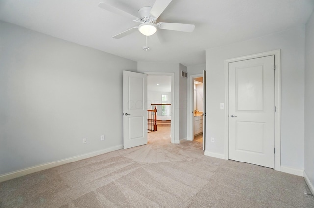 273 Blue Jacket Cir, Pickerington, OH 43147 - unfurnished bedroom featuring light carpet, baseboards, connected bathroom, and a ceiling fan