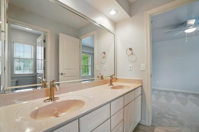 273 Blue Jacket Cir, Pickerington, OH 43147 - full bathroom with double vanity, toilet, a ceiling fan, and baseboards