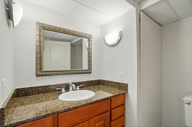 273 Blue Jacket Cir, Pickerington, OH 43147 - half bathroom with a drop ceiling, toilet, and vanity