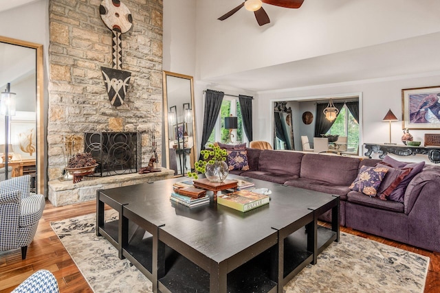 8547 Pitlochry Ct, Dublin, OH 43017 - living area with ceiling fan, wood finished floors, plenty of natural light, a fireplace, and high vaulted ceiling
