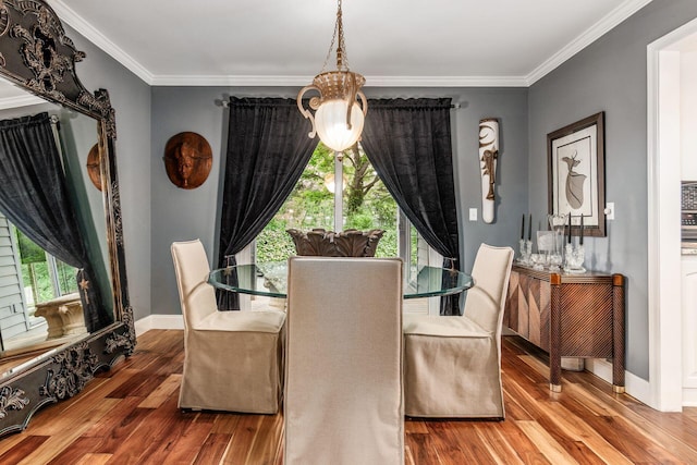 8547 Pitlochry Ct, Dublin, OH 43017 - dining room with plenty of natural light, wood finished floors, crown molding, and baseboards