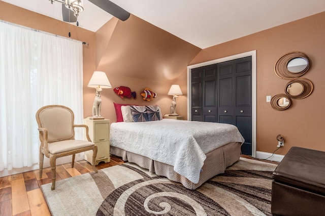 8547 Pitlochry Ct, Dublin, OH 43017 - bedroom with wood finished floors, a closet, lofted ceiling, and baseboards