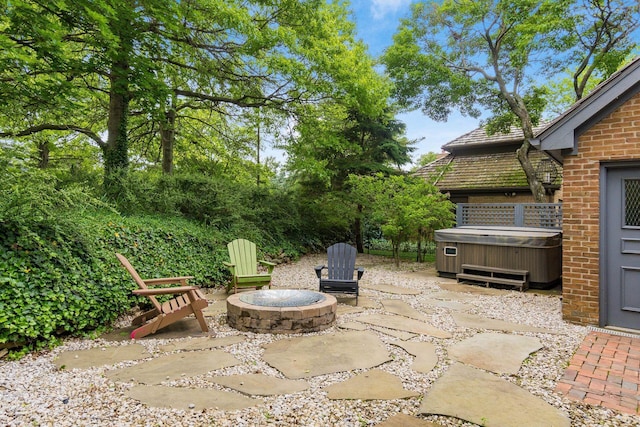 8547 Pitlochry Ct, Dublin, OH 43017 - view of patio with a hot tub and an outdoor fire pit