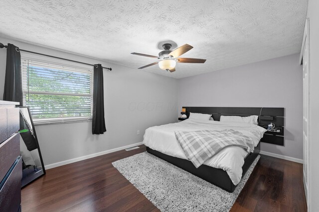 4373 Valley Quail Blvd S, Westerville, OH 43081 - bedroom with wood finished floors, baseboards, a textured ceiling, and a ceiling fan