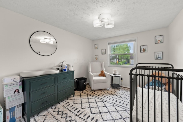 4373 Valley Quail Blvd S, Westerville, OH 43081 - bedroom with a crib and a textured ceiling