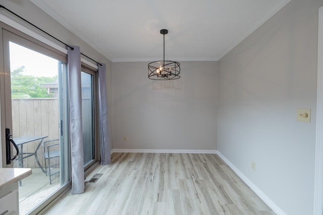 3243 Brookview Way Unit 68, Columbus, OH 43221 - unfurnished dining area featuring light wood-type flooring, a chandelier, ornamental molding, and baseboards