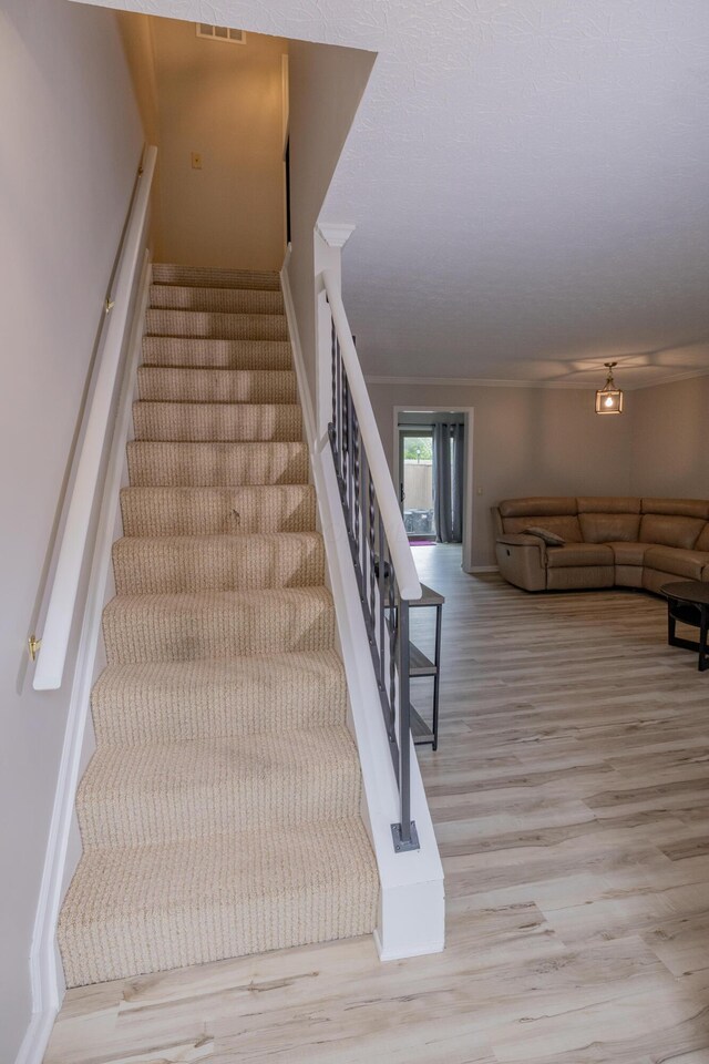 3243 Brookview Way Unit 68, Columbus, OH 43221 - stairs featuring wood finished floors