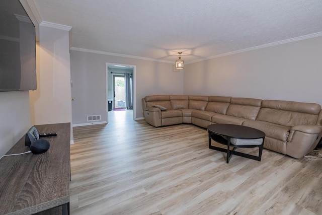 3243 Brookview Way Unit 68, Columbus, OH 43221 - living area with light wood-type flooring, crown molding, and baseboards