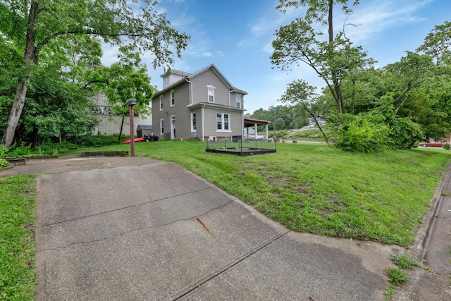 1904 Cedar Hill Rd, Lancaster, OH 43130 - view of side of property with a yard and driveway