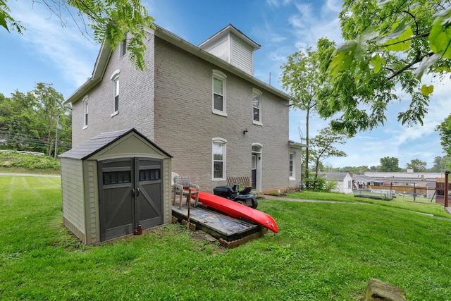 1904 Cedar Hill Rd, Lancaster, OH 43130 - back of property featuring a yard and brick siding