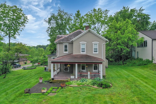 1904 Cedar Hill Rd, Lancaster, OH 43130 - view of front facade featuring a chimney, a porch, a front yard, and cooling unit