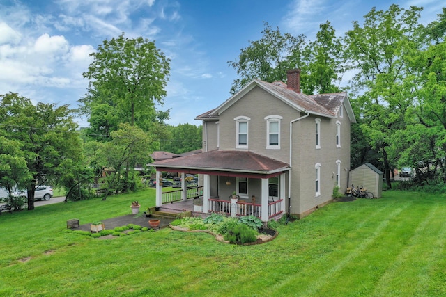 1904 Cedar Hill Rd, Lancaster, OH 43130 - back of property with a chimney, a yard, a porch, and a shingled roof