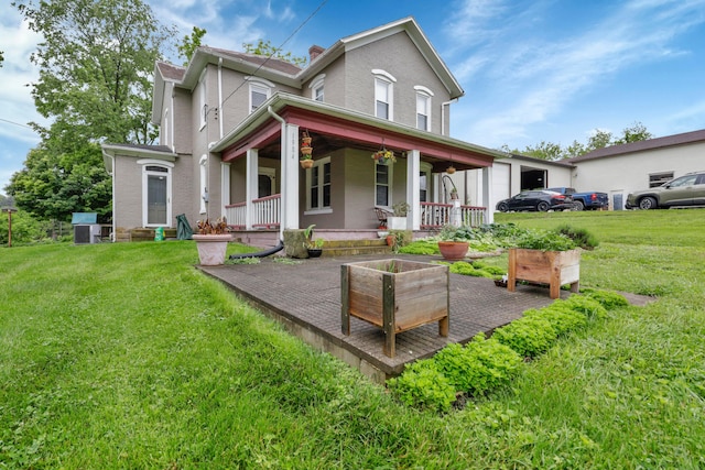 1904 Cedar Hill Rd, Lancaster, OH 43130 - back of property with a porch, brick siding, a yard, central AC unit, and a chimney