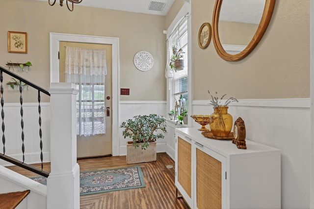 1904 Cedar Hill Rd, Lancaster, OH 43130 - entryway featuring wainscoting, wood finished floors, plenty of natural light, and stairs