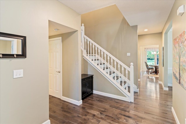 4560 Greyson Dr, Powell, OH 43065 - stairs featuring wood finished floors, baseboards, and recessed lighting