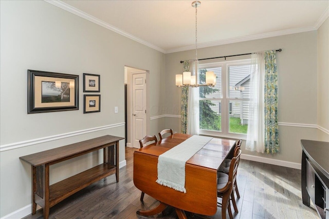 4560 Greyson Dr, Powell, OH 43065 - dining space featuring wood finished floors, crown molding, a chandelier, and baseboards