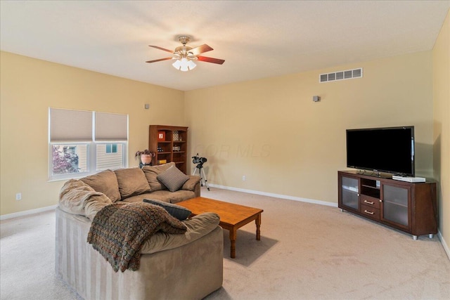 4560 Greyson Dr, Powell, OH 43065 - living room featuring light carpet, a ceiling fan, and baseboards
