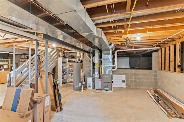 4560 Greyson Dr, Powell, OH 43065 - unfinished below grade area with heating unit, water heater, stairs, and concrete block wall