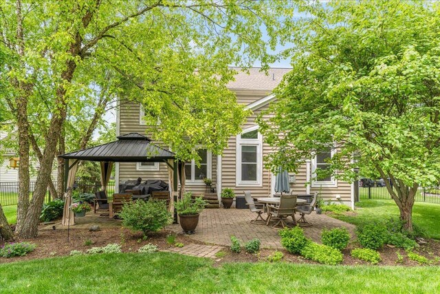 4560 Greyson Dr, Powell, OH 43065 - back of house featuring a gazebo, a patio, metal roof, and a standing seam roof