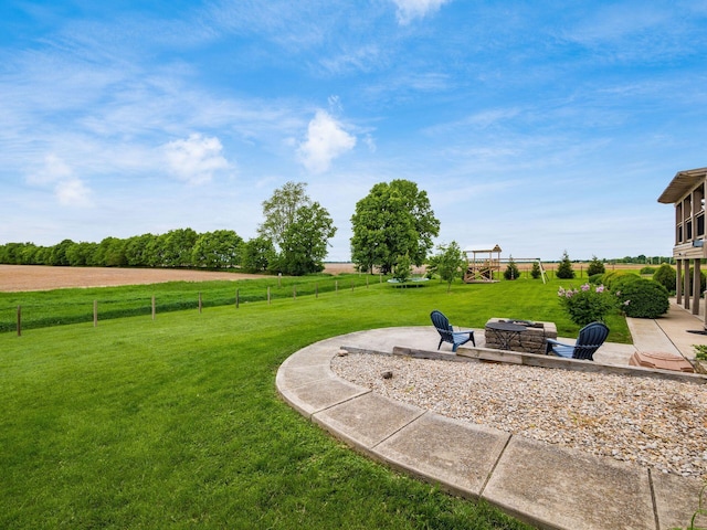 6621 State Route 257, Prospect, OH 43342 - view of yard with a fire pit, a patio area, and a view of rural / pastoral area