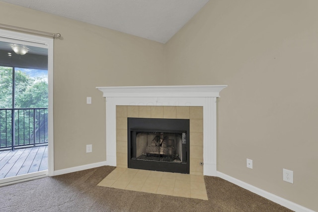 108 Shelbourne Forest Way, Delaware, OH 43015 - detailed view of a tiled fireplace, carpet, and baseboards