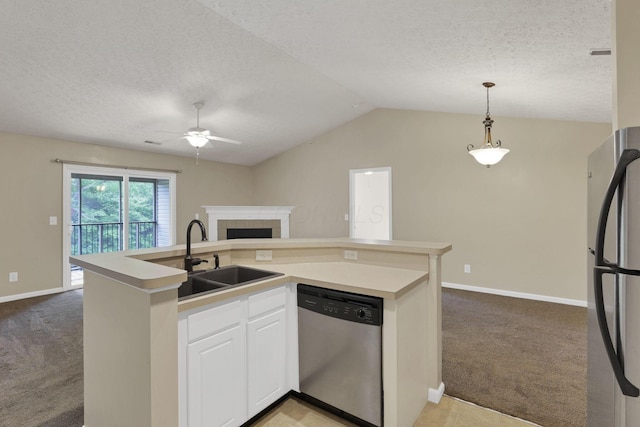 108 Shelbourne Forest Way, Delaware, OH 43015 - kitchen featuring appliances with stainless steel finishes, a sink, light colored carpet, open floor plan, and a ceiling fan