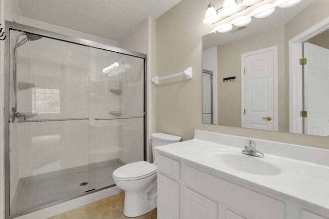 108 Shelbourne Forest Way, Delaware, OH 43015 - full bathroom featuring toilet, a stall shower, vanity, a textured ceiling, and tile patterned flooring