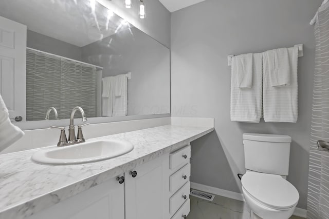 6022 Brice Park Dr Unit 17D, Canal Winchester, OH 43110 - full bath featuring vanity, marble finish flooring, toilet, baseboards, and a shower