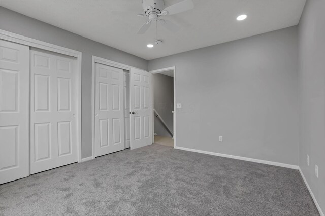 6022 Brice Park Dr Unit 17D, Canal Winchester, OH 43110 - unfurnished bedroom with multiple closets, carpet flooring, baseboards, recessed lighting, and a ceiling fan