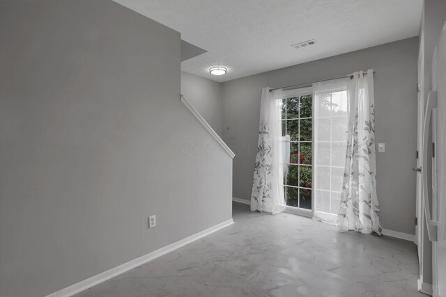 6022 Brice Park Dr Unit 17D, Canal Winchester, OH 43110 - entryway with baseboards, a textured ceiling, and stairs