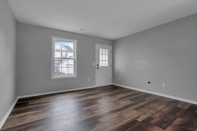 6022 Brice Park Dr Unit 17D, Canal Winchester, OH 43110 - foyer entrance with dark wood-style flooring and baseboards