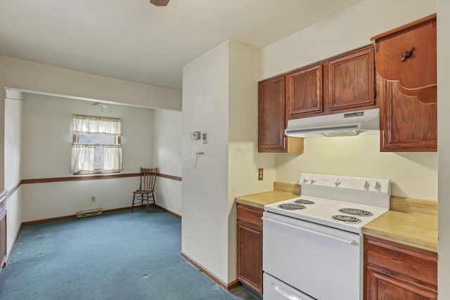 907 Fairfield Ave, Lancaster, OH 43130 - kitchen featuring electric stove, under cabinet range hood, dark colored carpet, light countertops, and baseboards