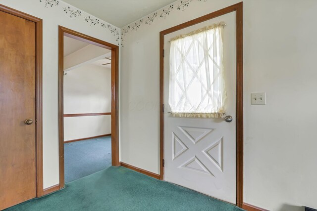 907 Fairfield Ave, Lancaster, OH 43130 - doorway with carpet flooring and baseboards